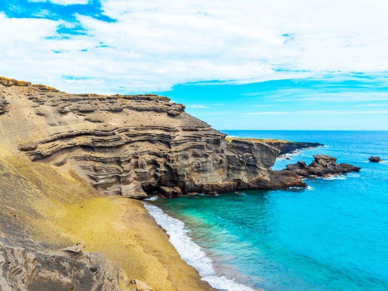 View of the beach Papakolea green sand beach in Hawaii.