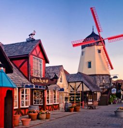 Dutch-style village at dusk with windmill