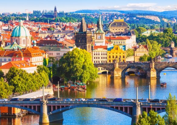 view of bridge and prague city skyline