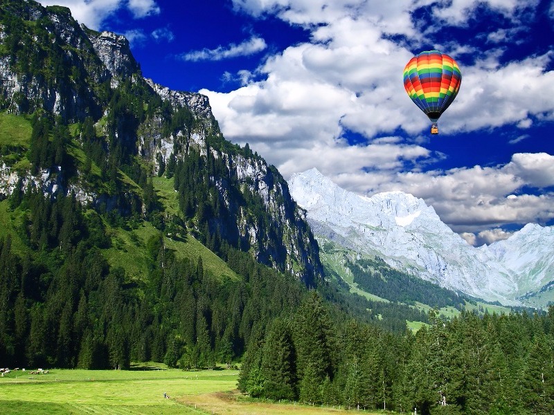 Hot-air balloon over the Swiss Alps near Ghaa