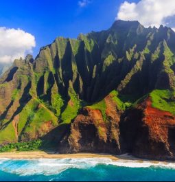 colorful cliffs contrasted by turquoise water