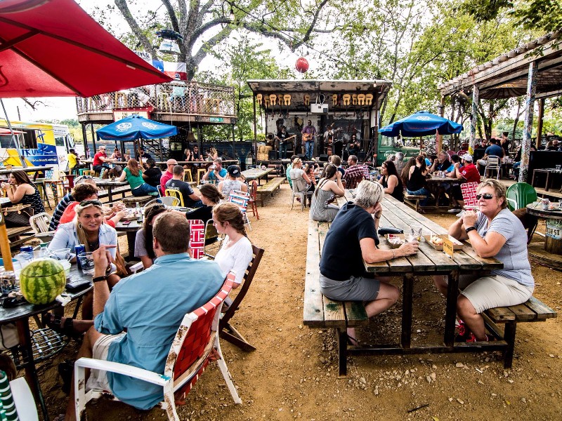 Outdoor seating and treehouse bar at Truck Yard