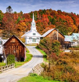 autumn foliage surrounding rural Vermont village