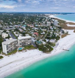 overview of coastal town with turquoise waters