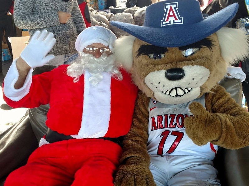 Santa and Mascot celebrating Christmas