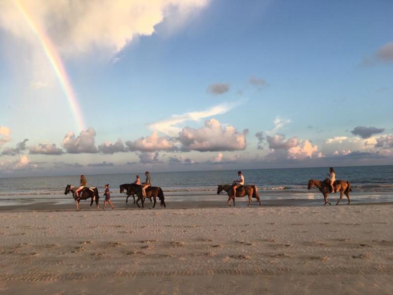 Horseback riding on the beach in Cape San Blas