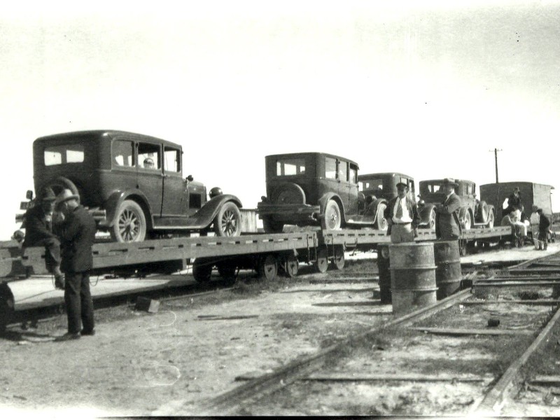 In the 1920s, cars were loaded on rail cars to reach Port Aransas. 