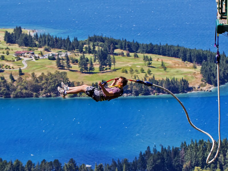 Tourist braves the Ledge Bungy in Queensland