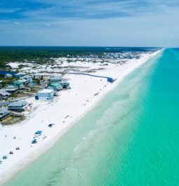 overview of coastal town with clear turquoise waters