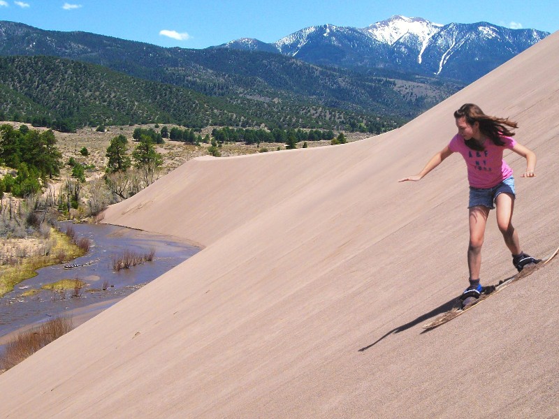 sandboarding at Great Sand Dunes National Park and Preserve