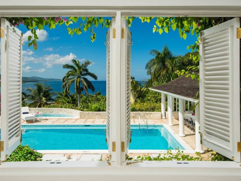 Pool and ocean view at  Round Hill Hotel & Villas