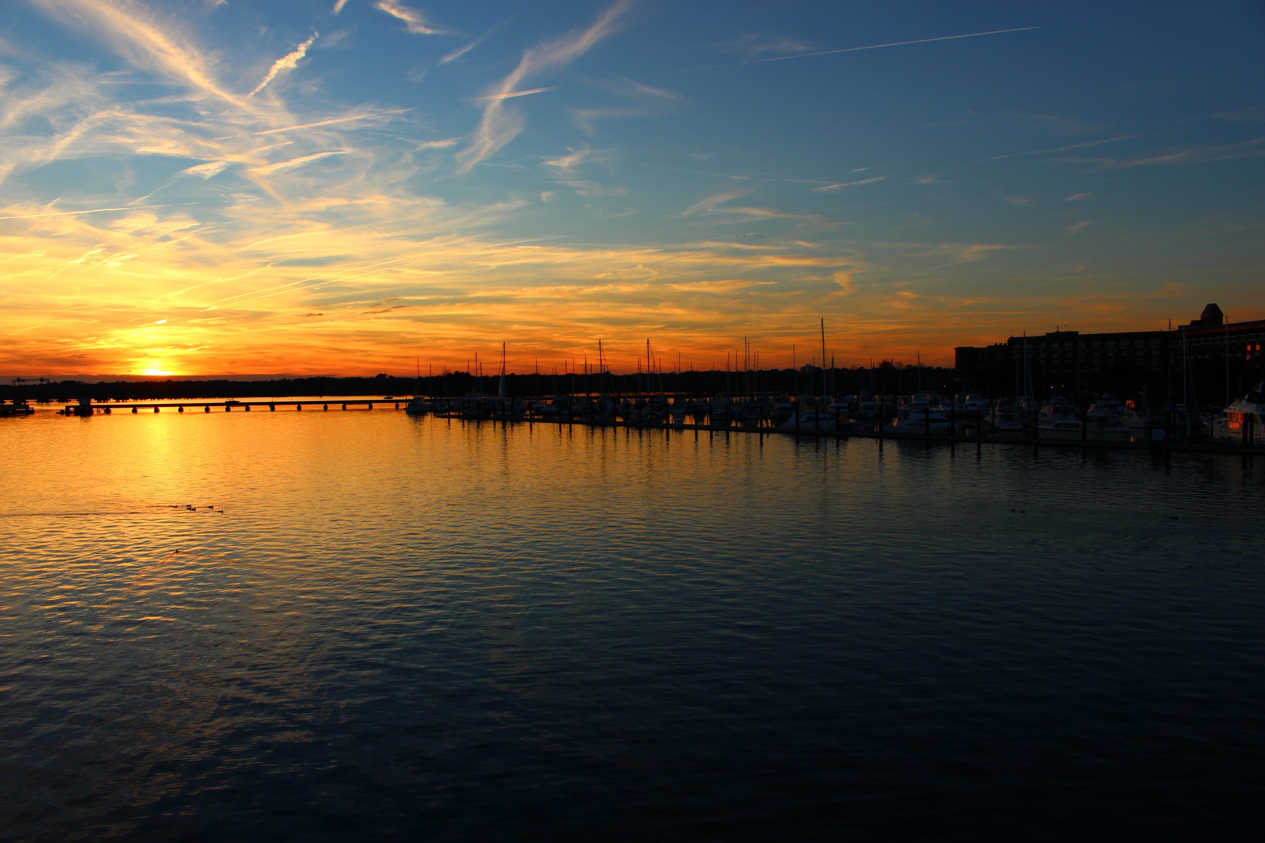 Fall Sunset in New Bern, North Carolina over the water from the Cunningham Bridge.