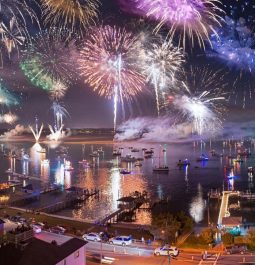 fireworks over waterfront in intracoastal wrightsville beach