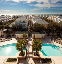 bird's eye view of beachfront resort with two pools