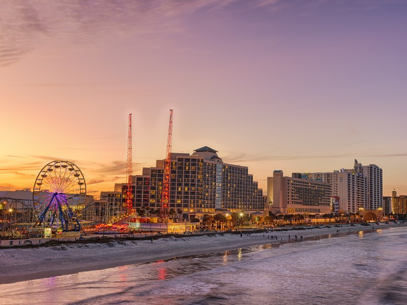 The popular boardwalk and pier at Daytona Beach has shops, restaurants and amusement rides.