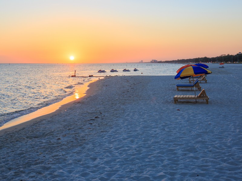 Sunset in Biloxi beach, Mississippi, along Gulf Coast shore