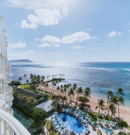 balcony view from kahala showing palm trees and ocean