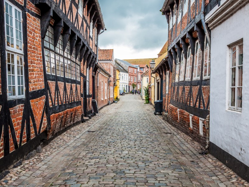 Street with historic homes in Ribe, Denmark