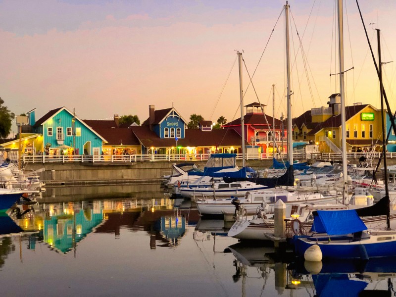 Colorful New England style buildings and boat marina at Shoreline Village in Long Beach