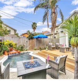 private pool deck with palm trees