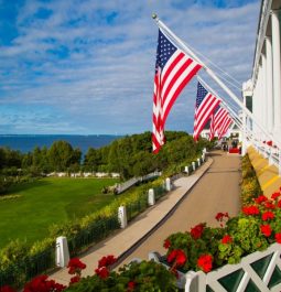 flag hanging outside grand hotel porch