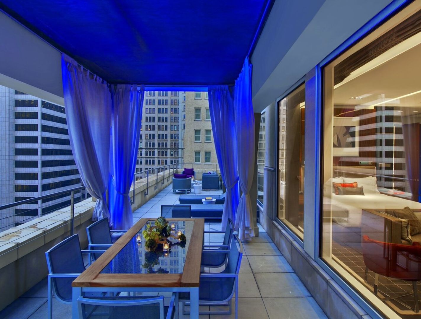 Dine outdoors on a balcony at the Joule Dallas.