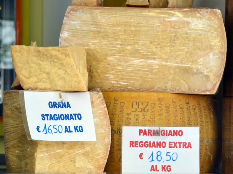 A gourmet cheese and meat shop with Parmigiano Reggiano, Italy