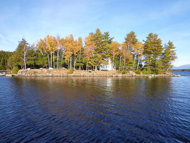 Private island with rustic cabin on large lake