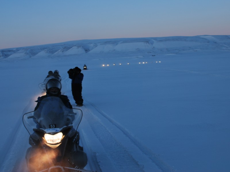 Snowmobiling near Longyearbyen, Norway