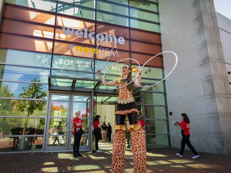 Performer outside the Peabody Essex Museum