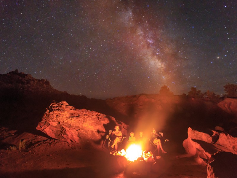 Family campfire at night