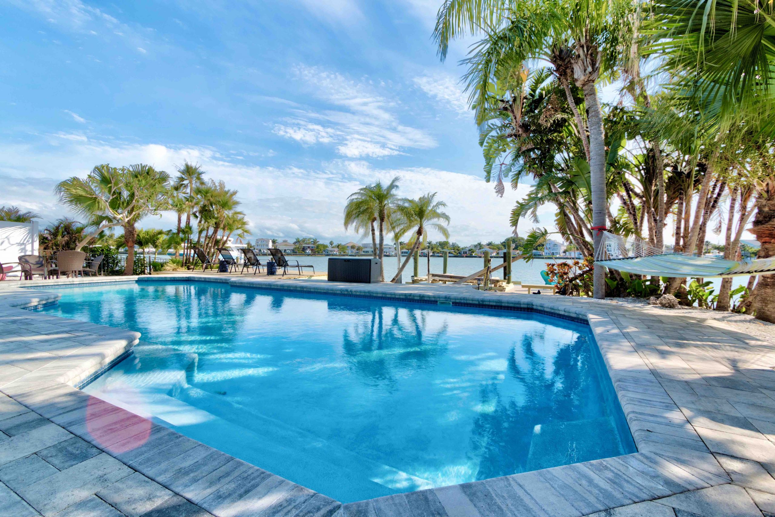 Spot Dolphins from the Pool at This Waterfront Home