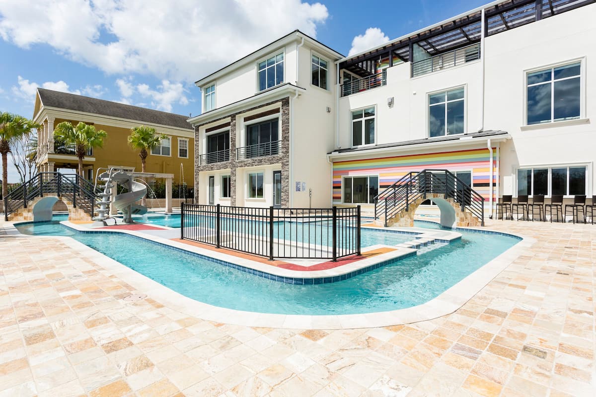 Pool with Lazy River at 14Bdrm Luxe Mansion