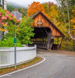 pretty street and covered bridge in Woodstock, Vermont