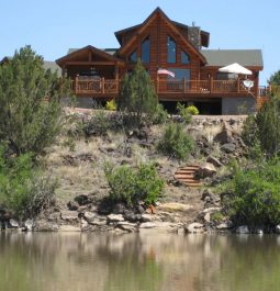 Grand log home on hill overlooking the lake