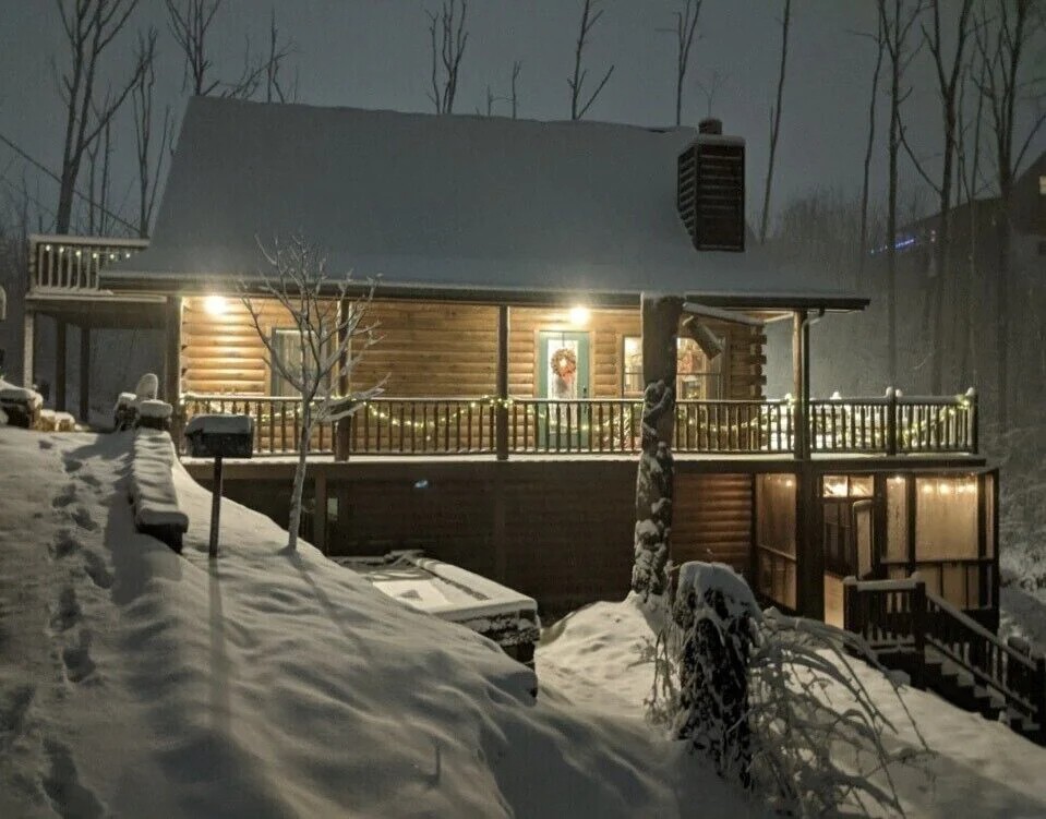 This cabin has a treehouse, theater and kids cave