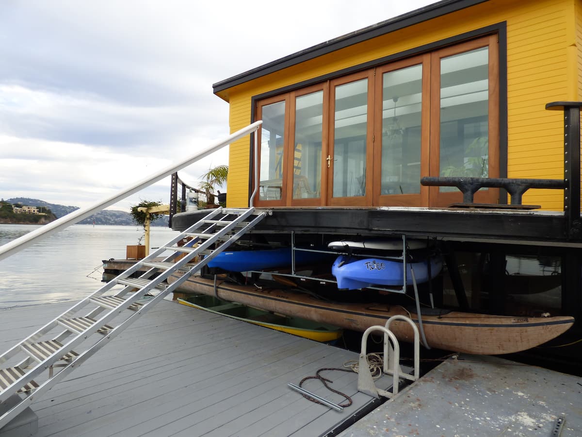 Kayaks, stand-up paddleboards, and a canoe available for guests