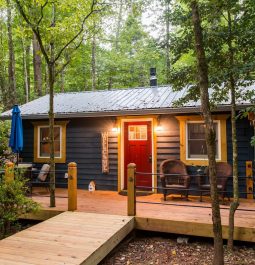 Cabin with porch light on