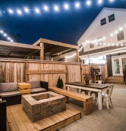 Outdoor seating area lit up at night