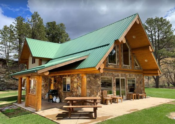 Exterior of cabin with outside seating