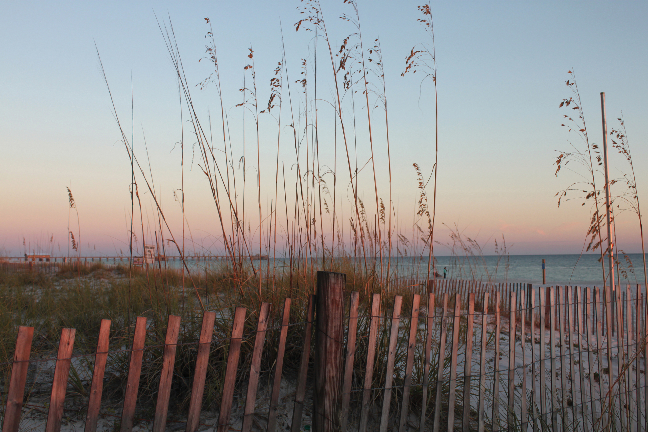 Take a walk on the beach at sunset here