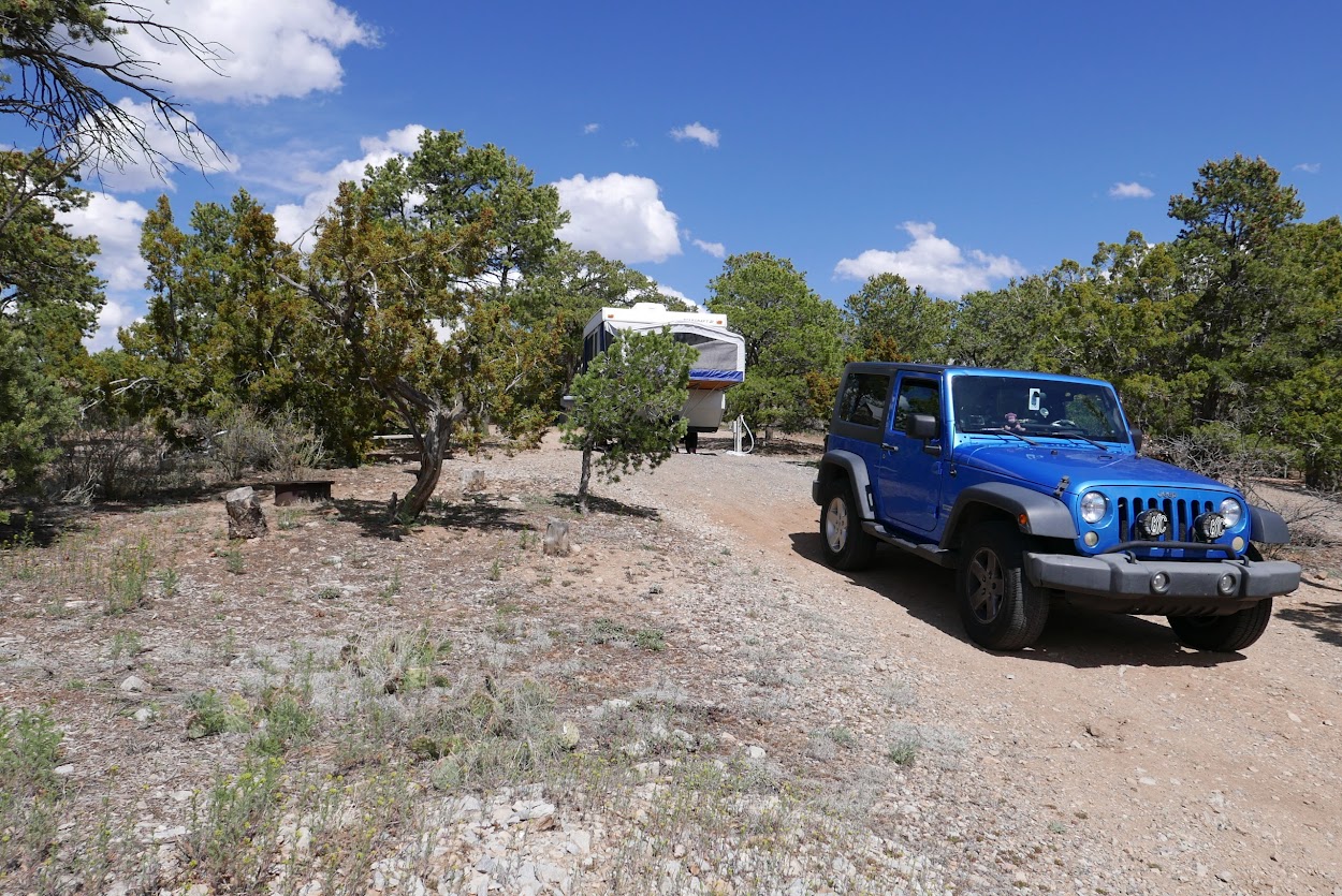 Spacious campsites with a nice little hiking trail behind them