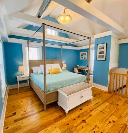 Bright blue walls in bedroom