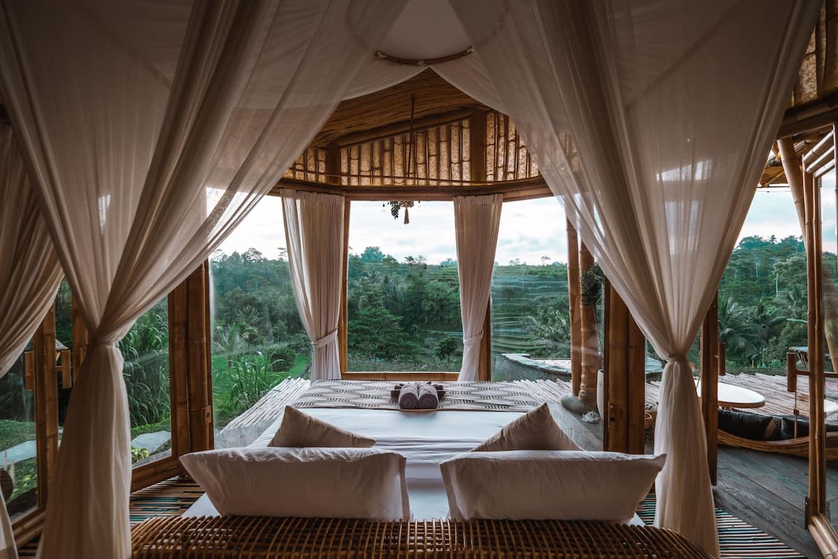 semi-open bedroom looking out to gorgeous views