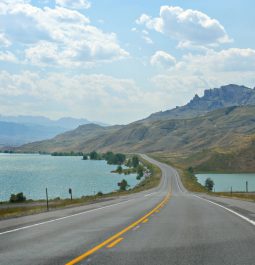 blue reservoir waters and mountain views