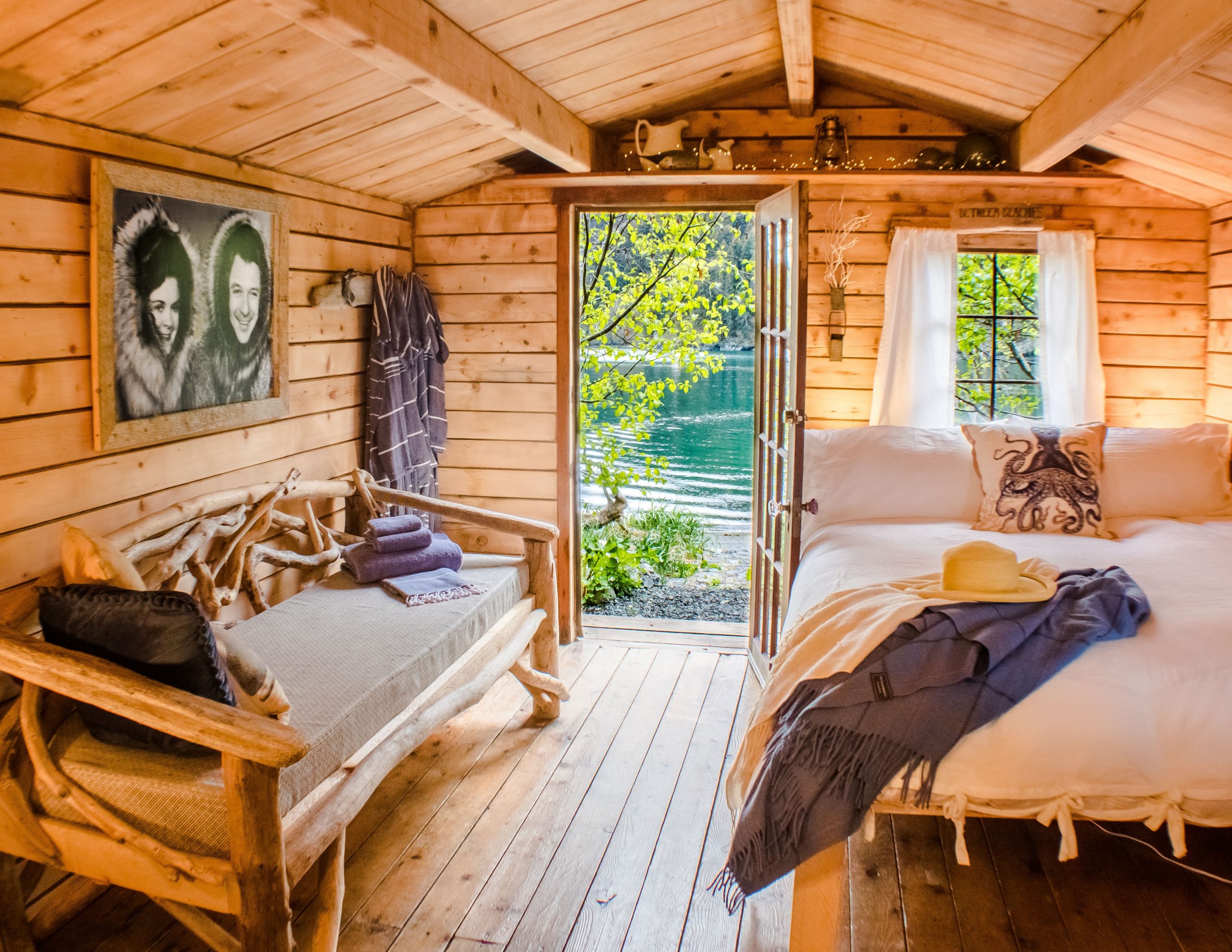 Wooden cabin bedroom with two beds