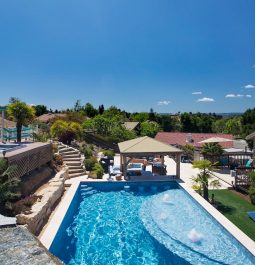 aerial of outdoor pool and hot tub