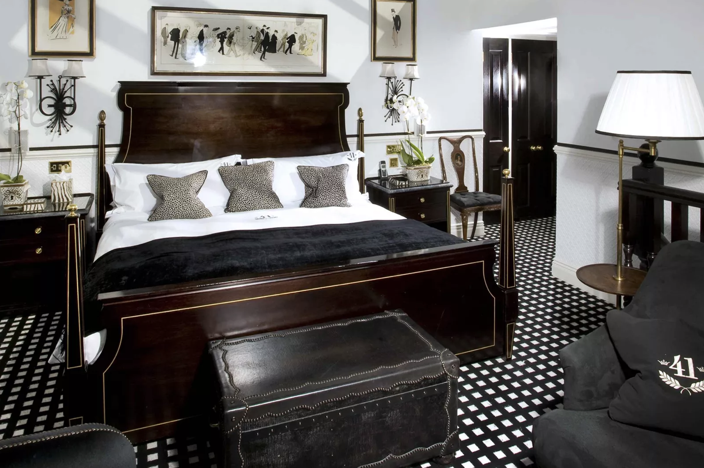 Monochrome bedroom with stylish cushions