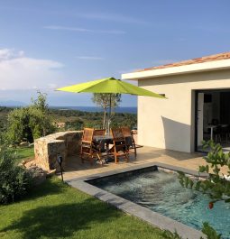 outdoor dining table and swimming pool