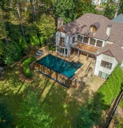 Aerial view of home and pool